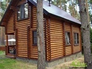 Заказать деревянный дом из бревна с отделкой 